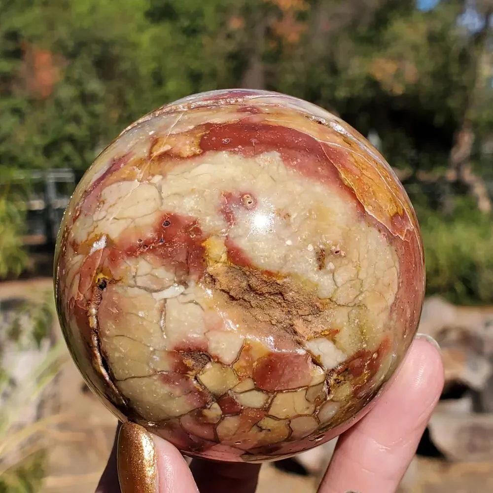 Pink Ocean Ibis Jasper Brecciated Sphere w/ Caves Druzy 458 grams 71mm